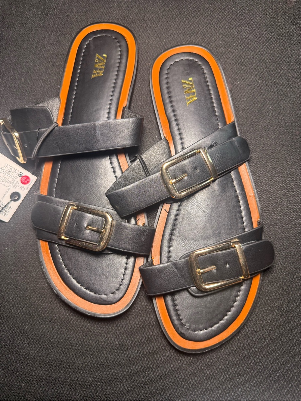Zara Black Slide Sandals with Orange Edge and Gold Buckles